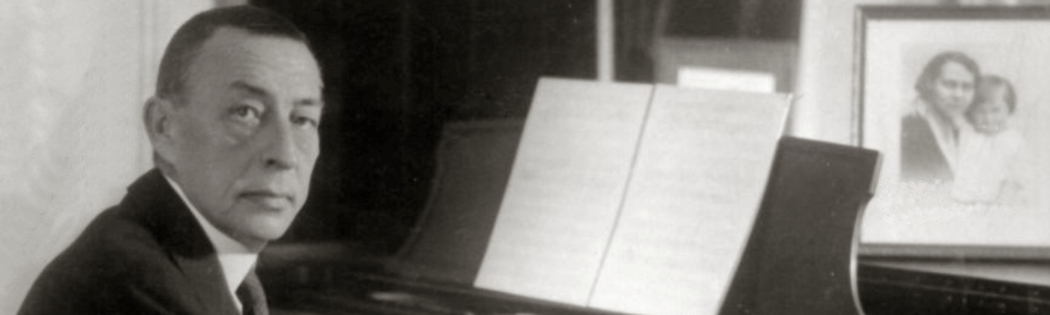 Russian composer Sergei Rachmaninoff playing his Steinway grand piano at his home (1936 or before)